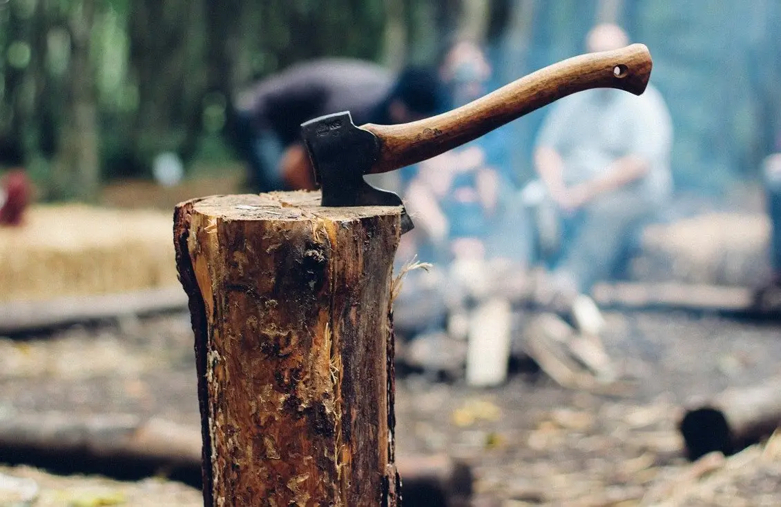 backpacking-hatchet-in-log