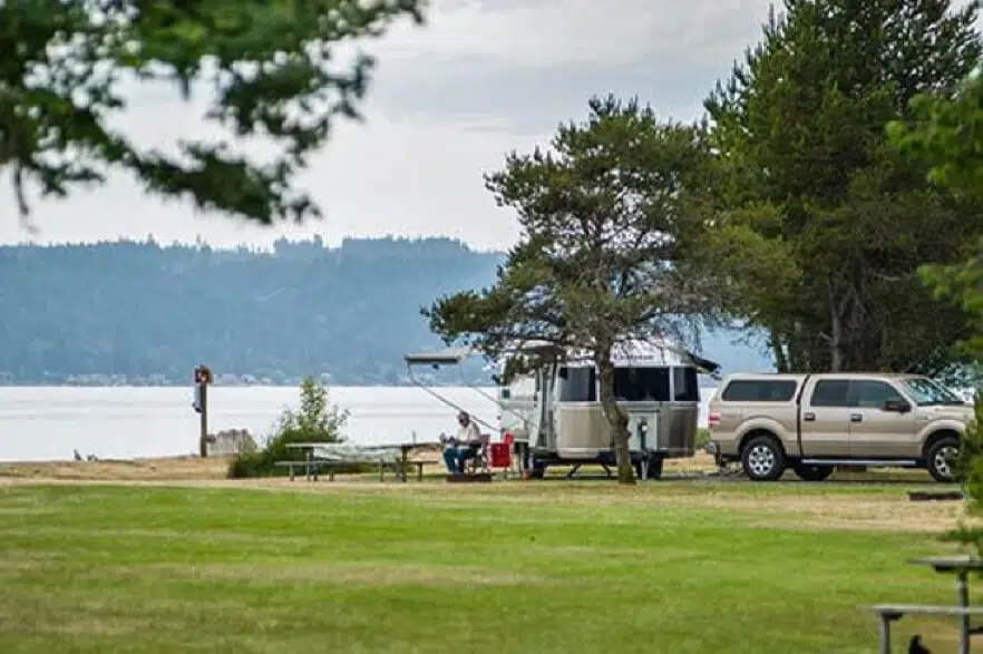 Belfair State Park 7 An RV parked in a state park near a lake.