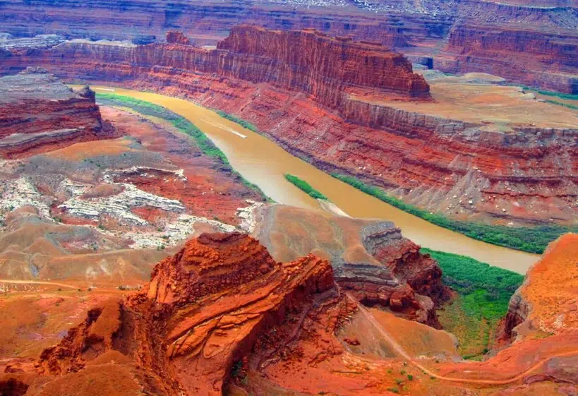 Dead Horse Point State Park 9 An aerial view of a stunning canyon with a meandering river, located within a State Park.