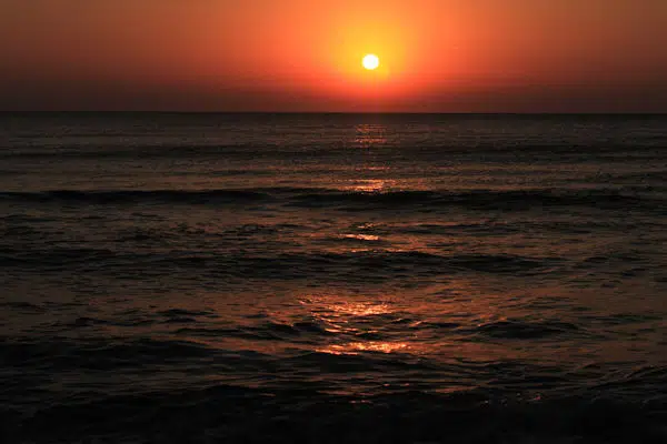 sunset over ocean in state park near destin florida