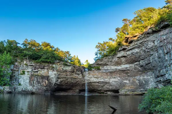 waterfall down rock face at desoto state park in alabama