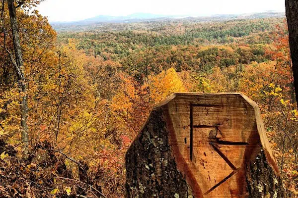 hilltop view overlooking fall foliage at fairy stone state park in virginia