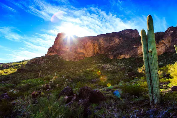 Best State Parks Near Phoenix, AZ (2025 Guide) 1 sun rising over a rock formation in a state park near phoenix arizona