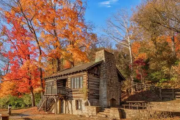 fall foliage surrounding a historic building in a state park near rockford illinois