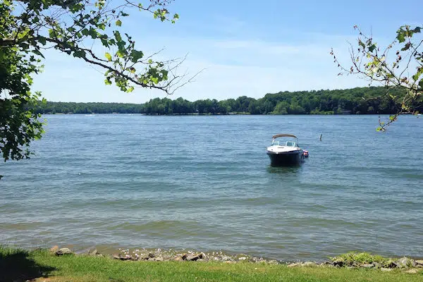 boat off the shore at lake anna state park in virginia