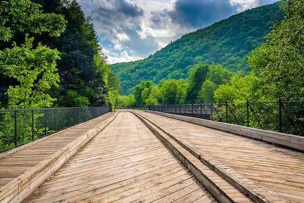 bridge backed by mountains in a state park near allentown pennsylvania
