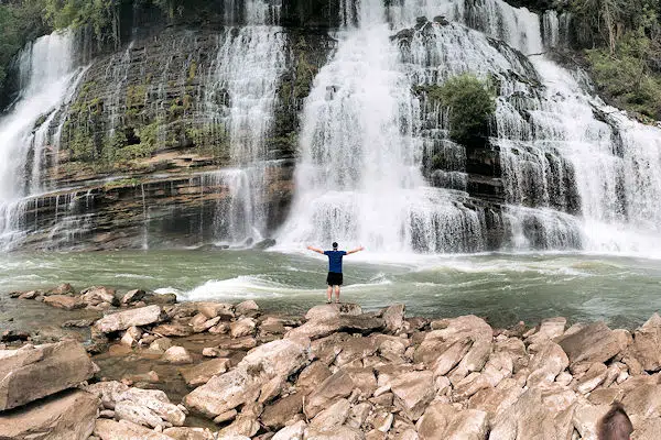 man near a waterfall in a state park near murfreesboro tennessee