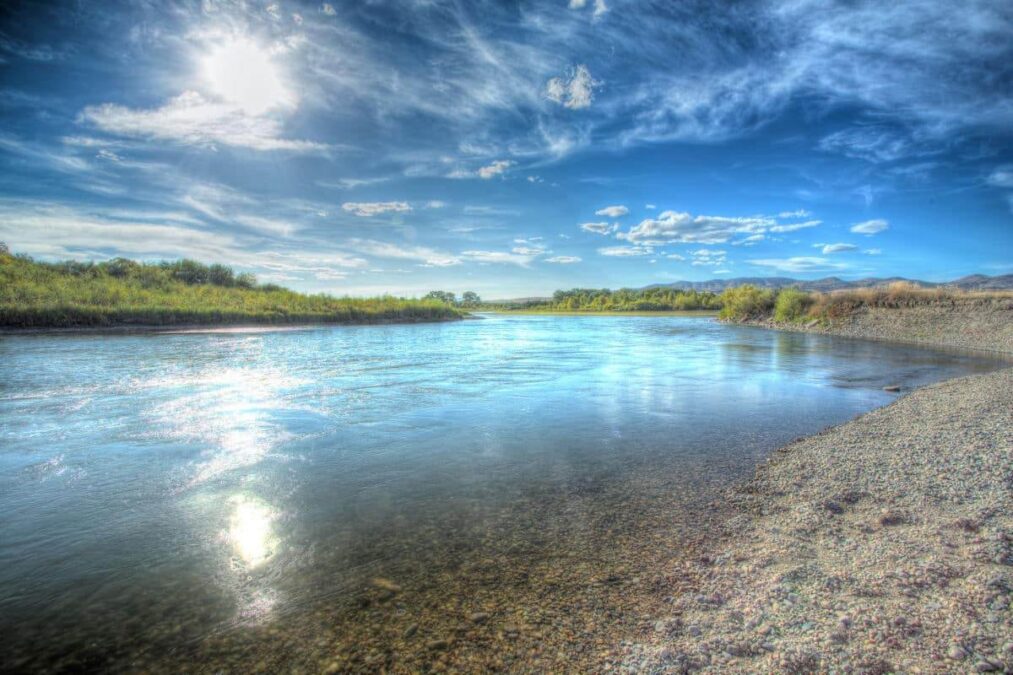sunset over a river through a state park near billings montana