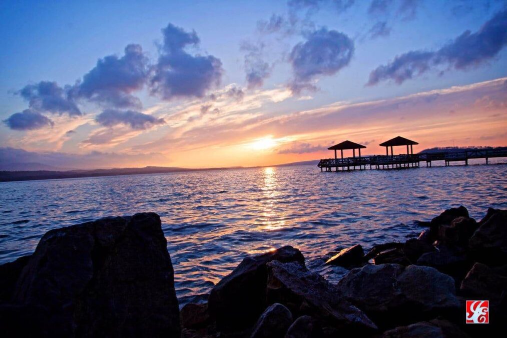sunset over a lake in a state park near hot springs arkansas