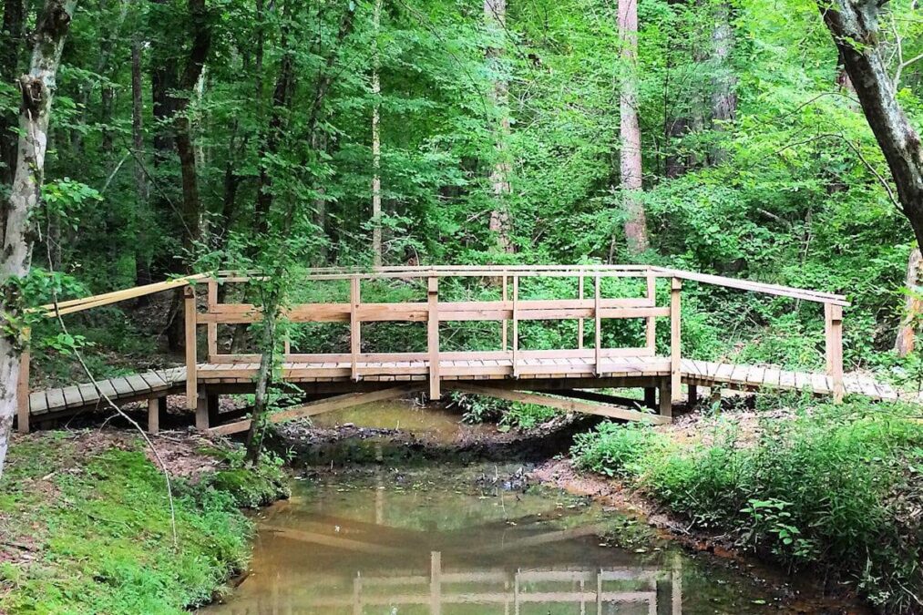 wooden bridge over a creek in a state park near jackson tennessee