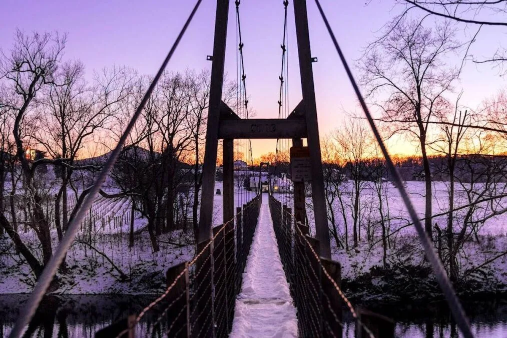 snow on a bridge at Seven Bends State Park