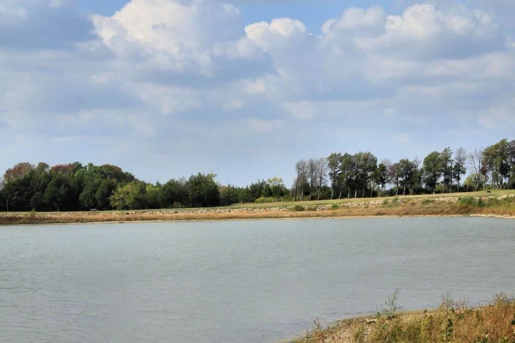 The dam that impounds Bonham State Park Lake