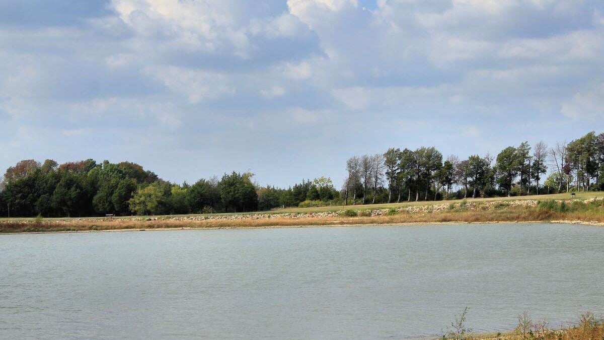 The dam that impounds Bonham State Park Lake