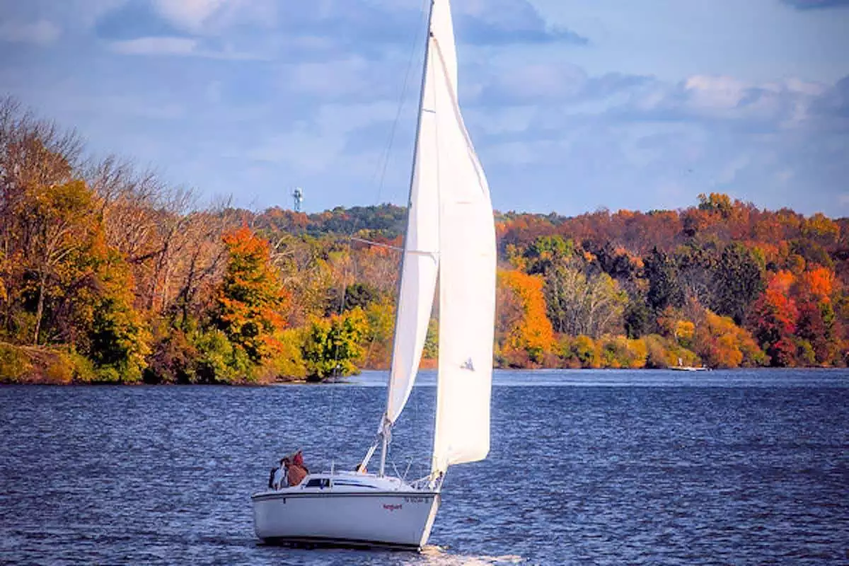 A sailing boat on the lake in Nockamixon State Park in autumn