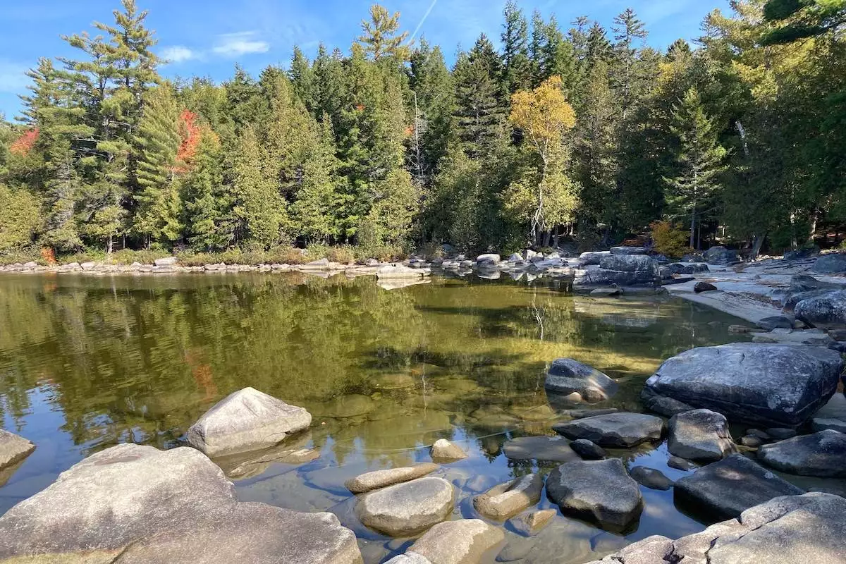 rocks in the water by one of the beaches at Peaks-Kenny State Park
