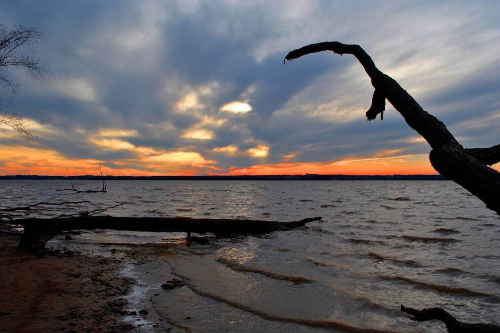 cloudy sunset over the water at a state park near winchester virginia