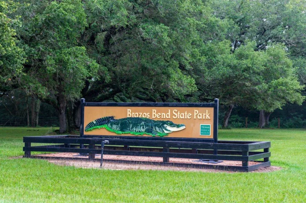 Brazos Bend State Park sign in Needville, TX, along the Brazos River