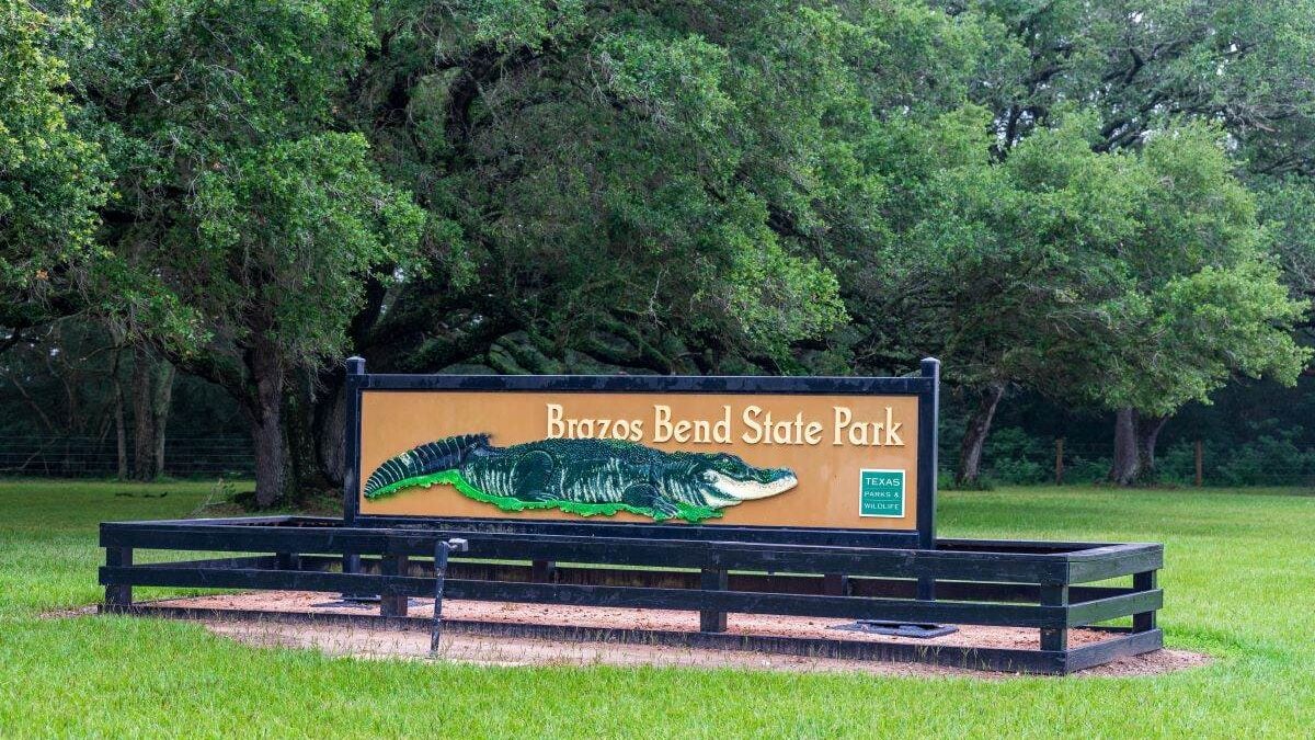 Brazos Bend State Park sign in Needville, TX, along the Brazos River