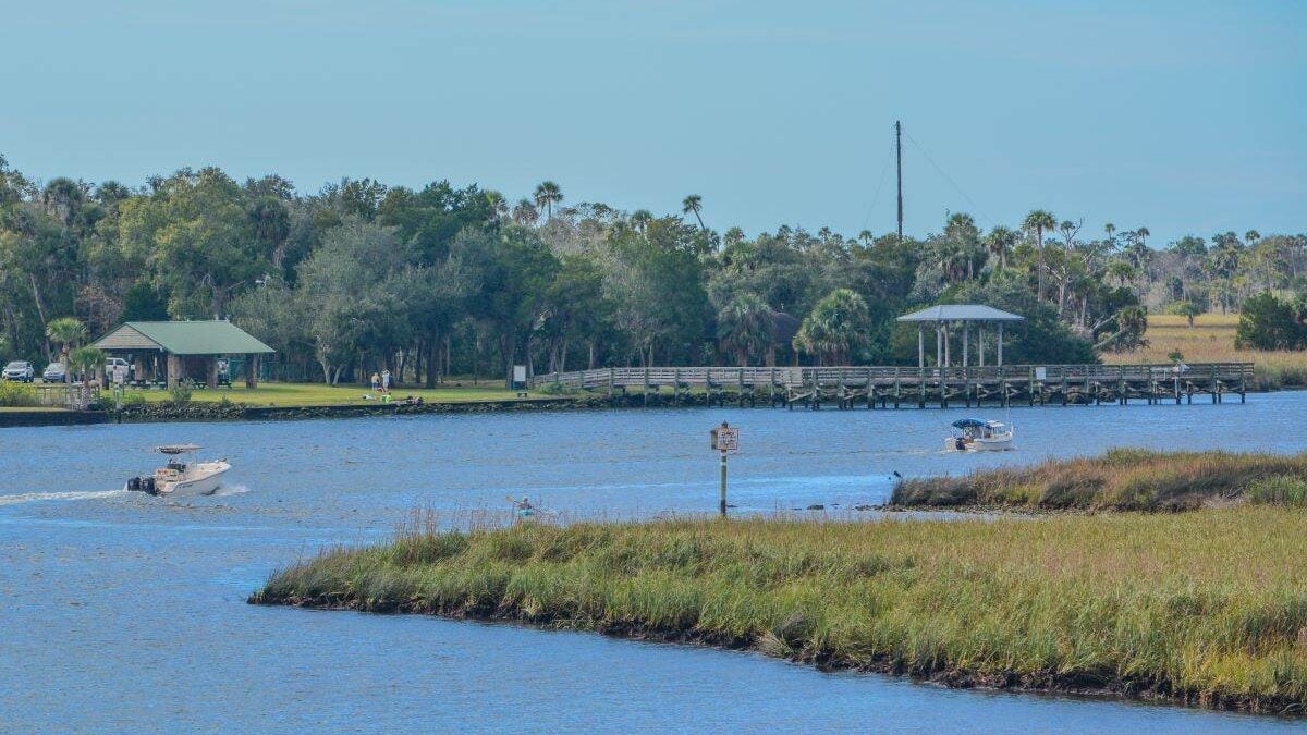 boats cruising on the Crystal River at Crystal River Preserve State Park