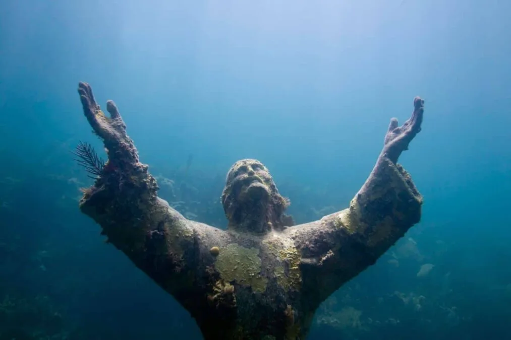 Religious underwater statue encrusted in corals at John Pennekamp Coral Reef State Park
