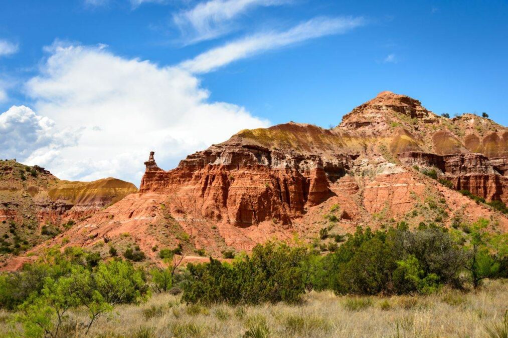 hills rise above the trees at Palo Duro Canyon State Park