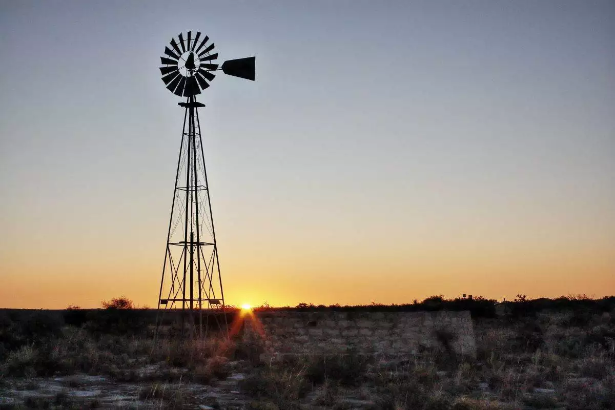 Windmill at sunrise at Seminole Canyon State Park in Texas