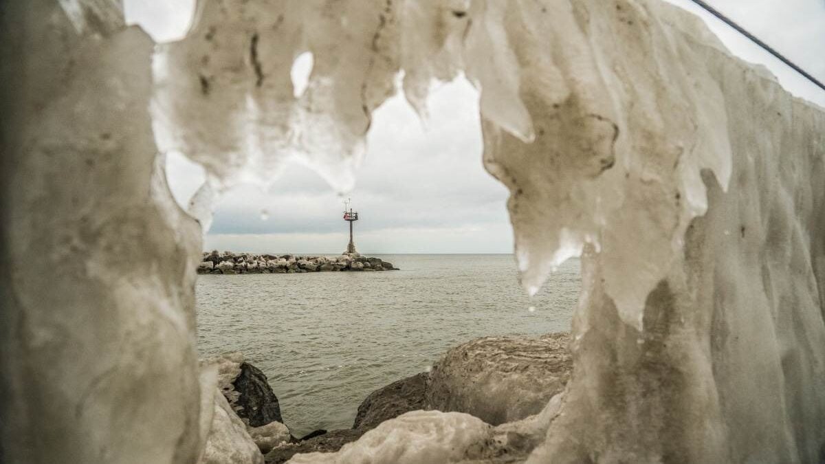 Jetty through a hole in the ice at Geneva State Park