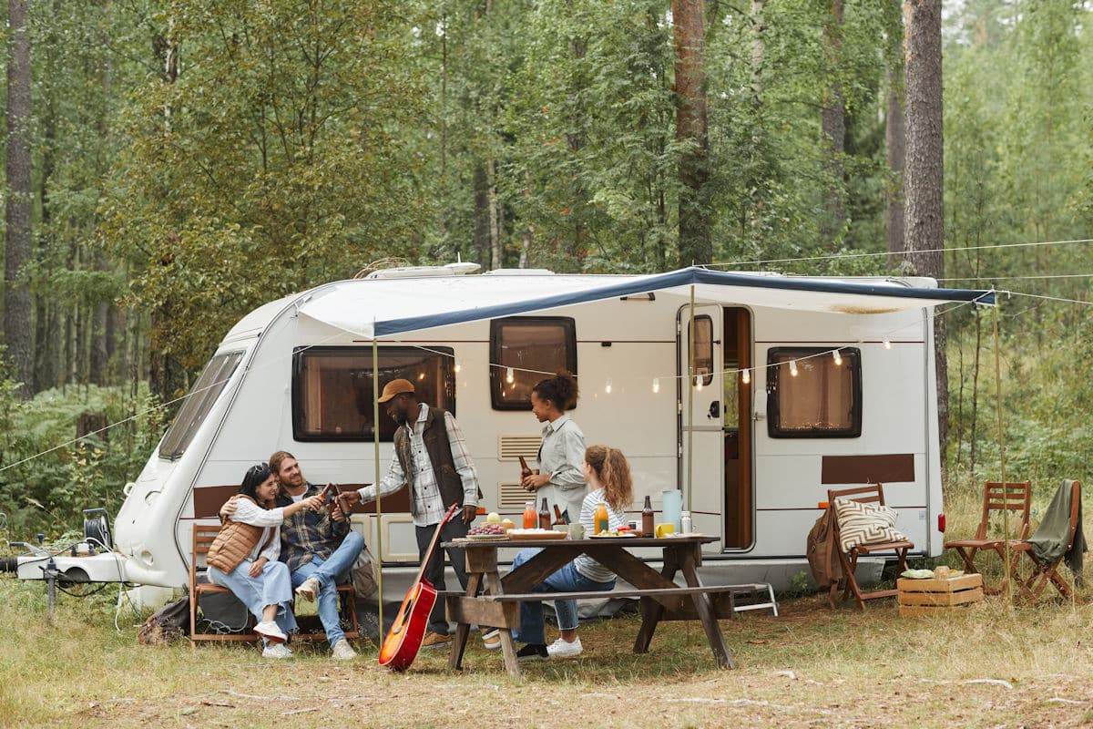 friends camping with a towable RV at a state park