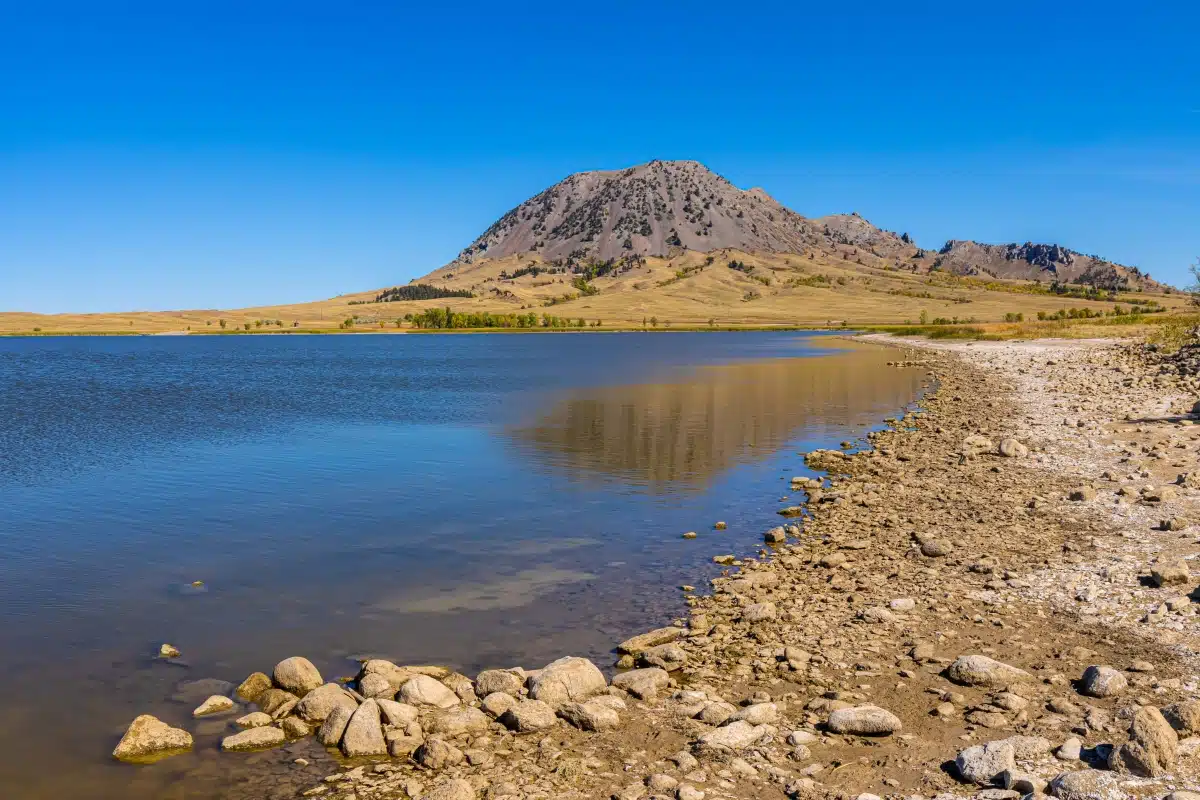 The lake at Bear Butte State park on a sunny day