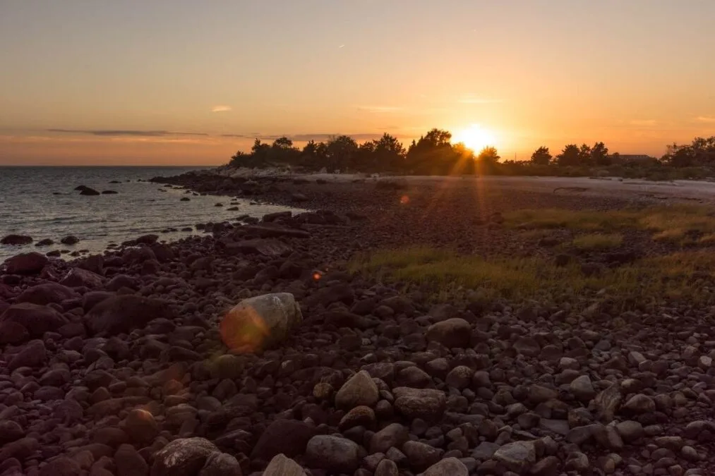 Sunset on Long Island Sound from Hammonasset State Park with lens flare
