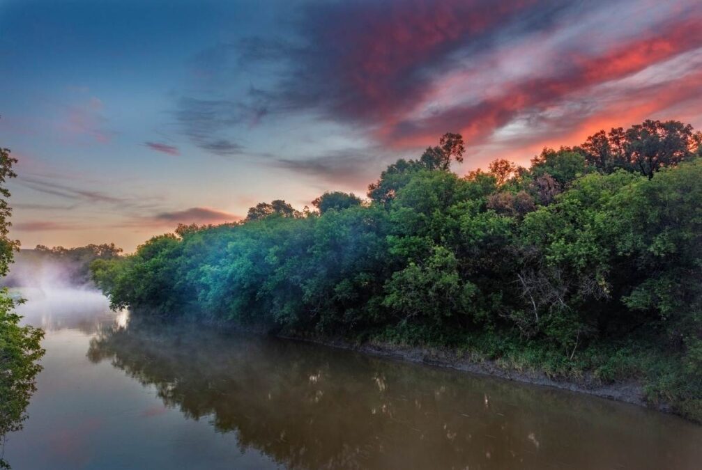 Sunrise sky over the Sheyenne River at Fort Ransom State Park, North Dakota, USA