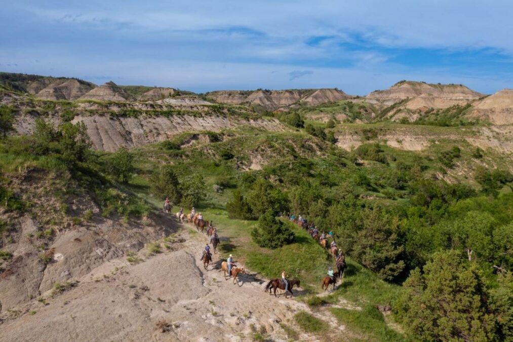 Group horse ride through Little Missouri State Park