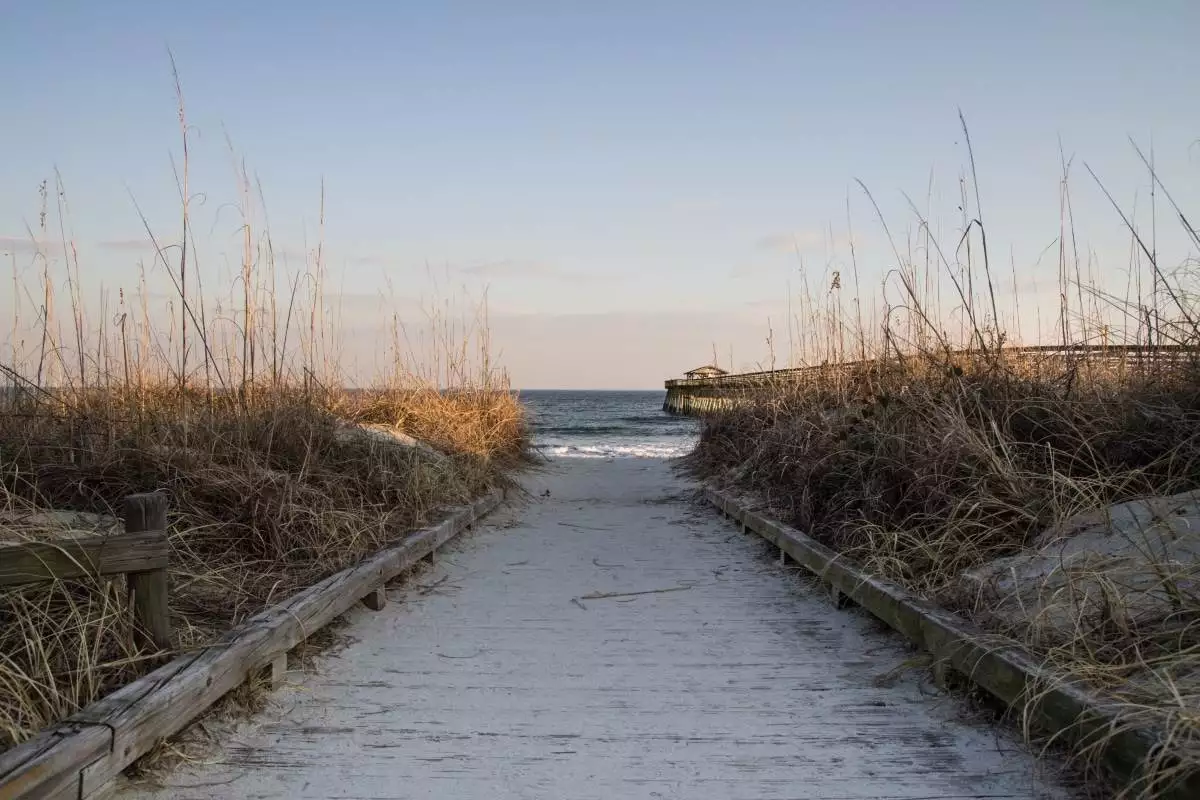 a path through the dunes to the beach at Myrtle Beach State Park