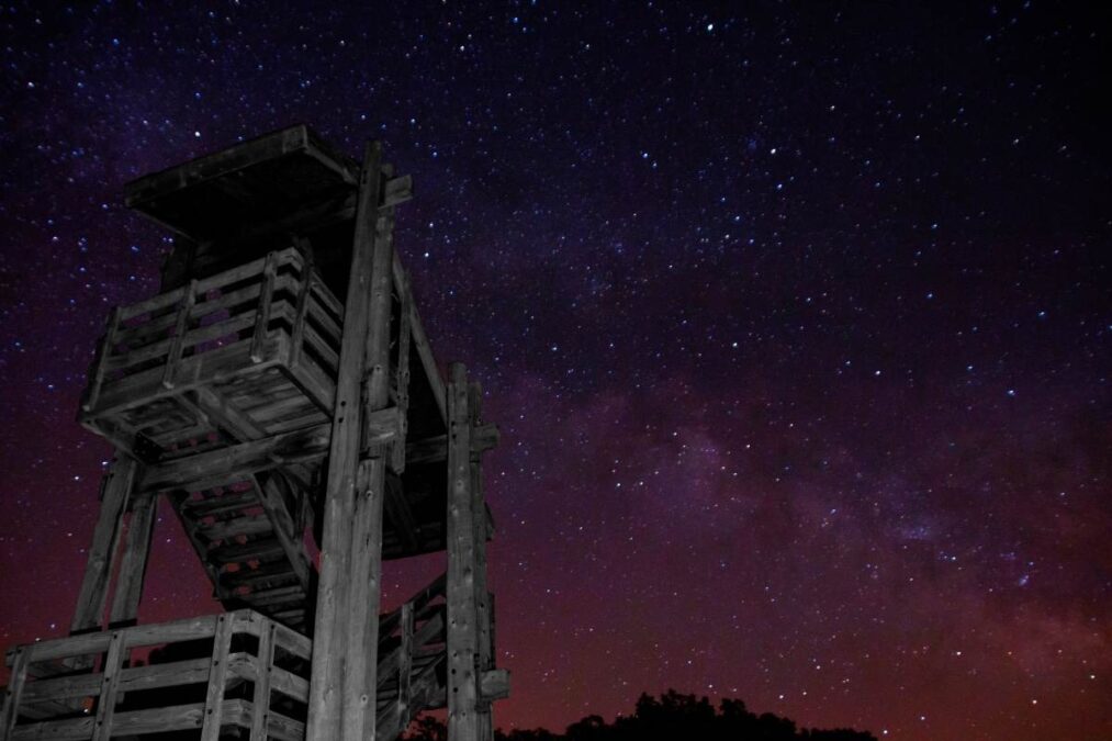 a watchtower under the stars at Newton Hills State Park