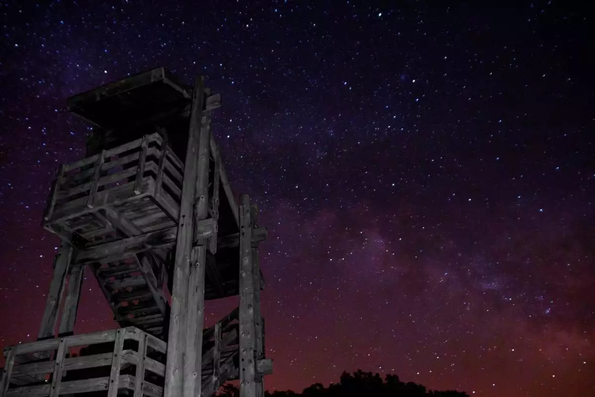 a watchtower under the stars at Newton Hills State Park