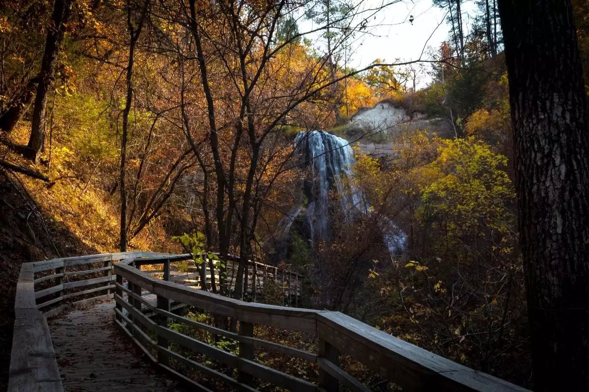 Wooden pathway to the waterfall at Smith Falls State Park