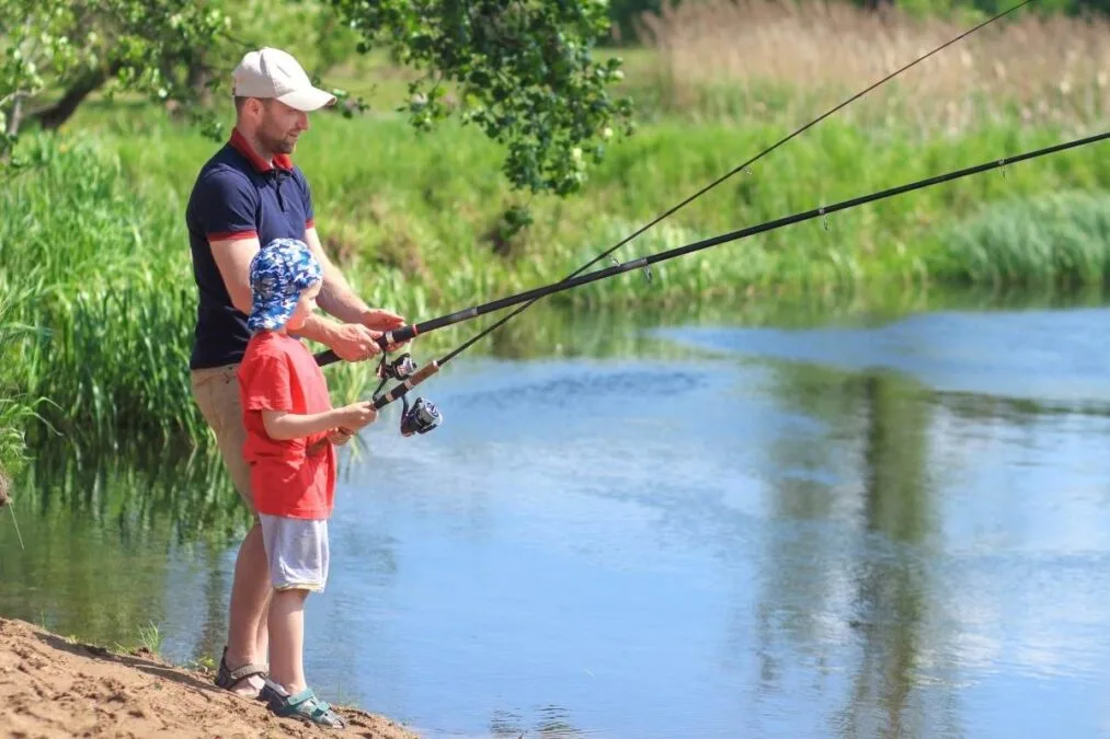 father and son fishing at Snake Den State Park