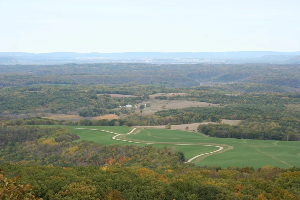 Patchwork of farm fields and wooded hills seen from Blue Mound State Park, Wisconsin