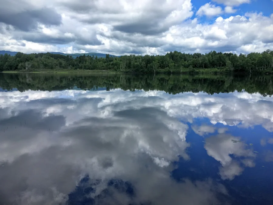 Clouds reflected in Spectacle Pond at Brighton State Park, Vermont