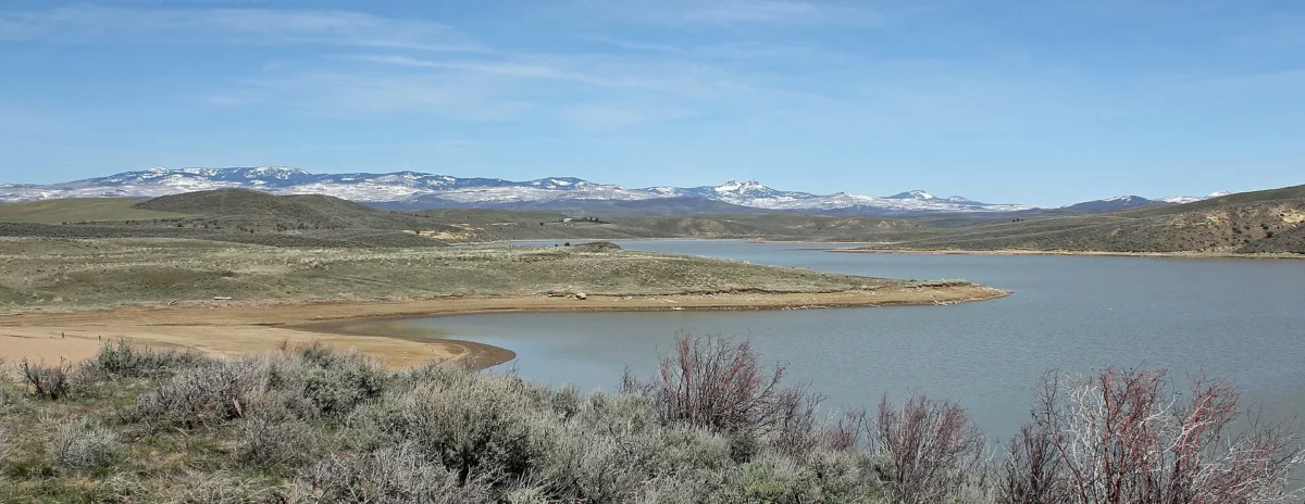Elkhead Reservoir State Park 5 Elkhead Reservoir with a mountain ridge behind it in Elkhead Reservoir State Park, Colorado