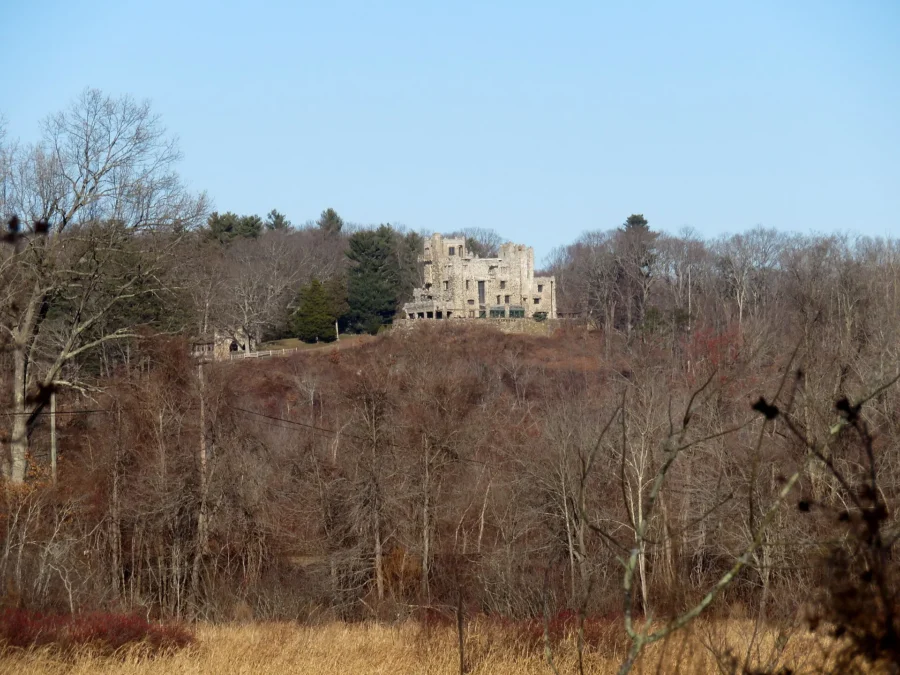 Gillette Castle on its hilltop seen from across the Connecticut River in Chester