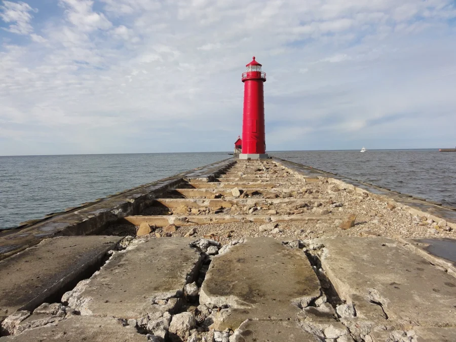 Red lighthouse at the end of the pier on Lake Michigan at Grand Haven, Michigan