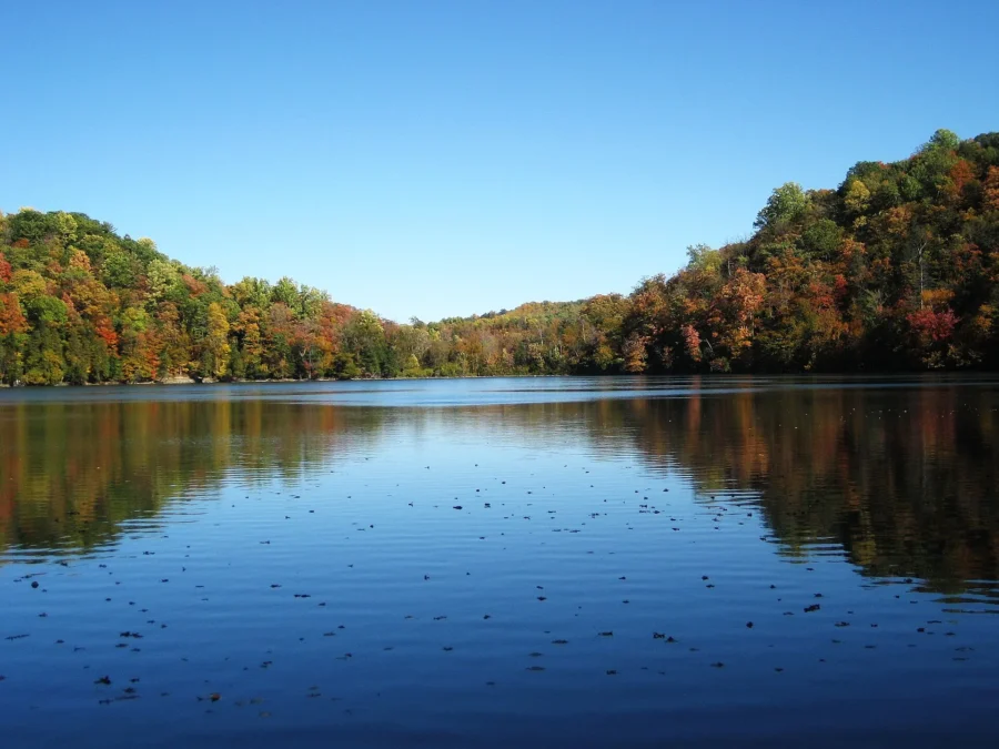Green Lakes State Park 57 Calm lake reflecting autumn-colored wooded hills at Green Lakes State Park, New York