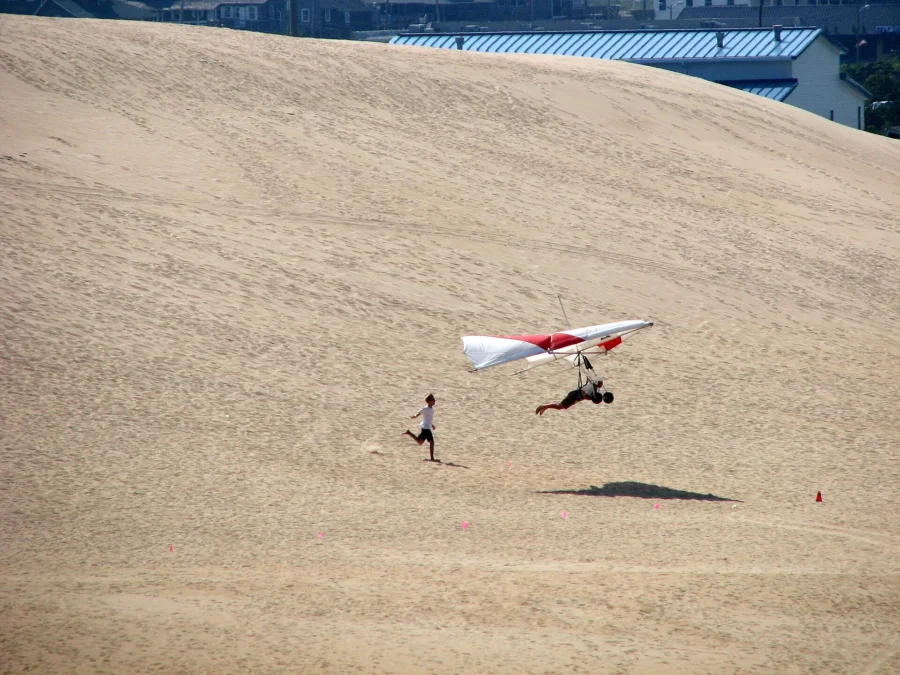 Hang glider launching from the big sand dune at Jockey’s Ridge State Park, North Carolina
