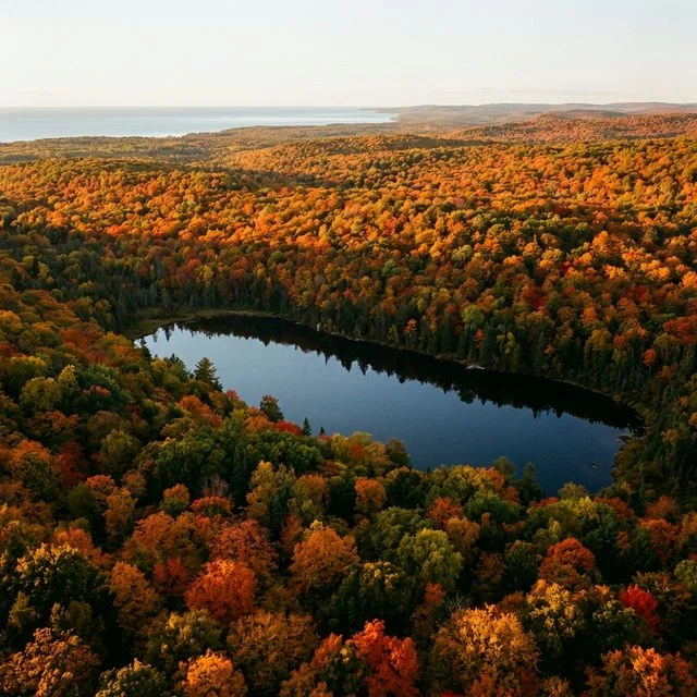 Aerial view of Lake of the Clouds surrounded by brilliant fall foliage at Porcupine Mountains Wilderness State Park